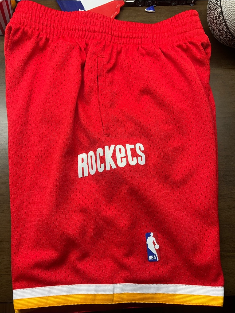 Mitchell & Ness - Classic Red Rockets Mens Basketball Shorts with Yellow Trim